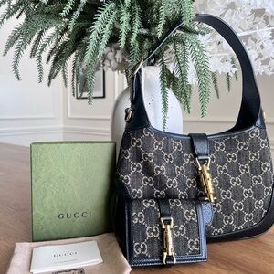 Gucci Jackie Denim bag with matching wallet.